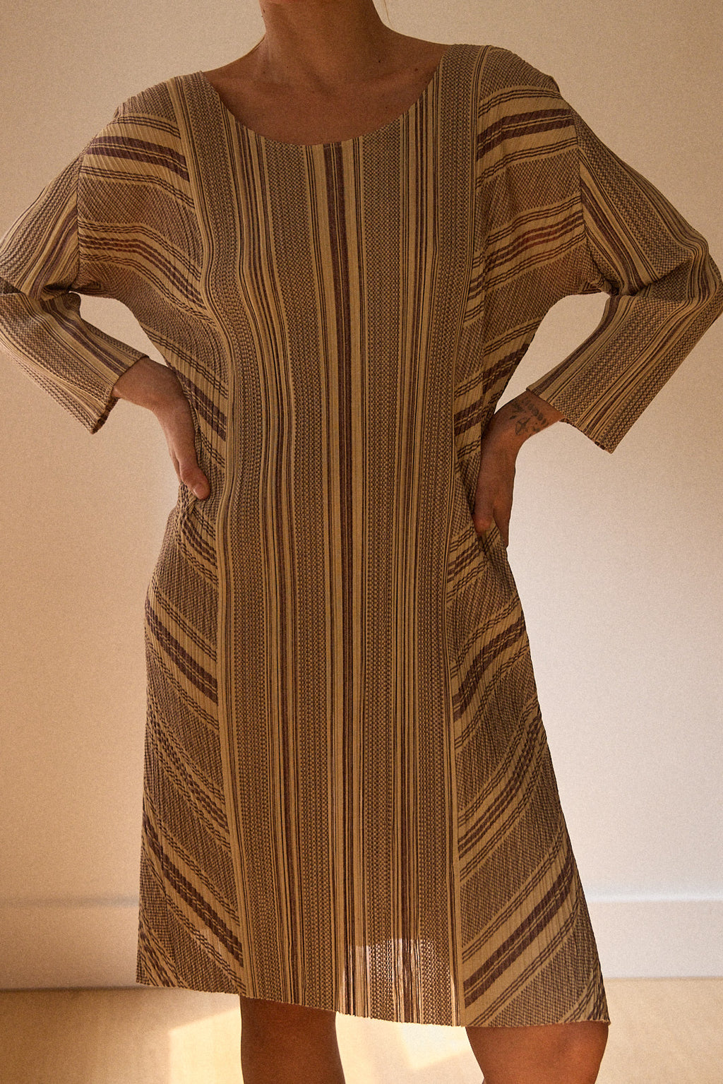 Pleats Please cream dress