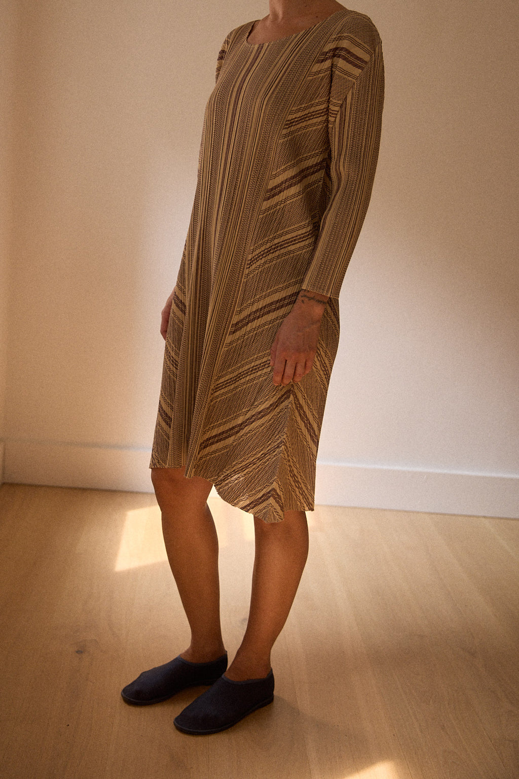 Pleats Please cream dress